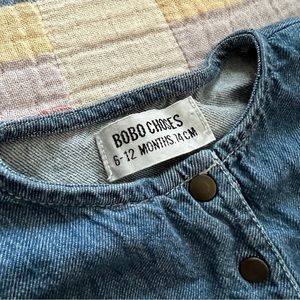 Bobo Choses denim dress with embroidered cherries and ducks. Snap front.